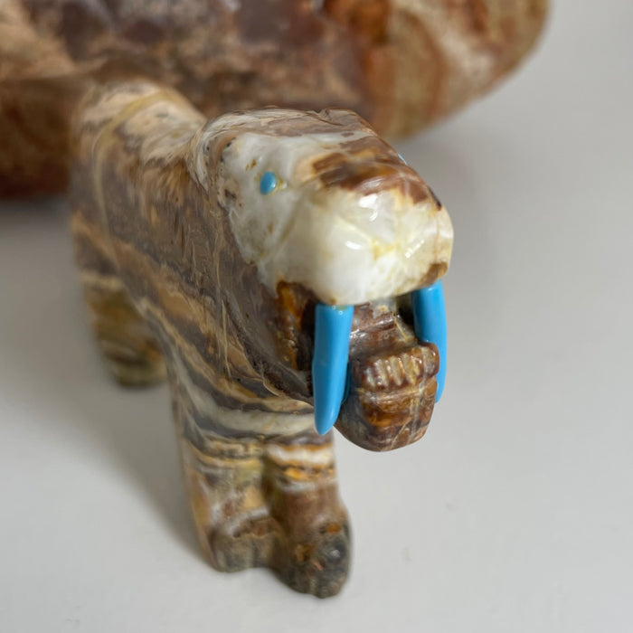 Sabre Tooth Cat Carving, by Cody Nastacio