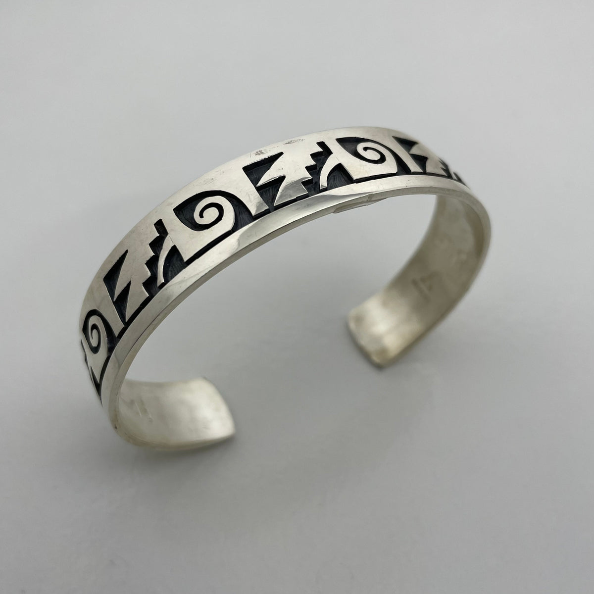 Silver Hopi Water and Kiva Bracelet, by Steward Dacawyma– Raven 